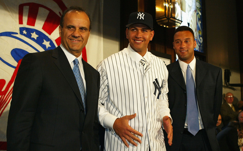 Joe Torre and Derek Jeter flank A-Rod at a 2004 press conference. Photo credit: Ezra Shaw/Getty.
